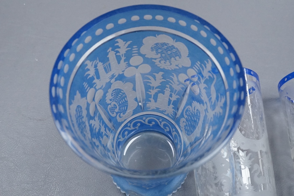 A German engraved blue flashed glass vase and four similar beakers, late 19th/early 20th century, beaker 15cm high.